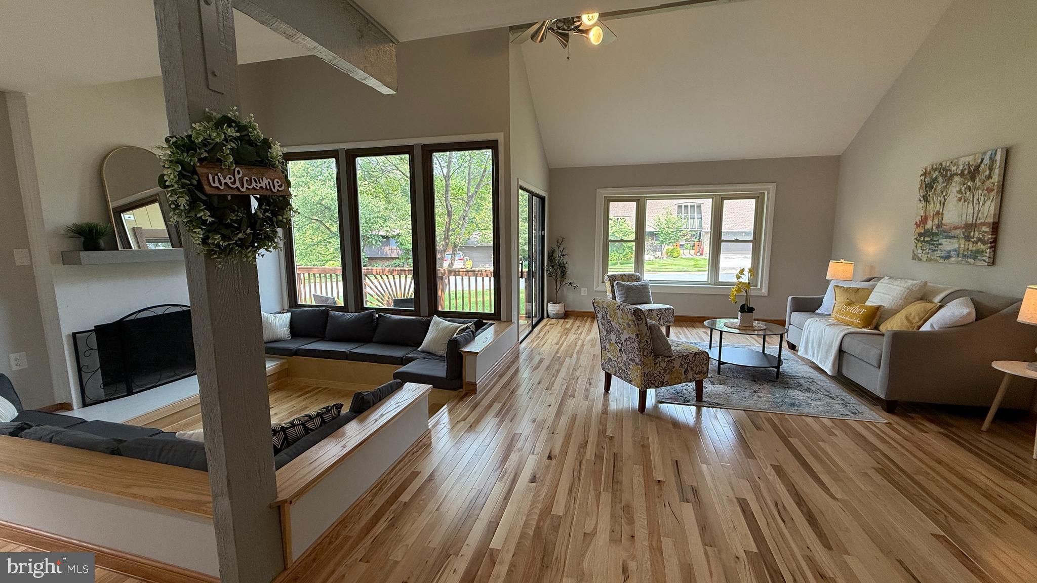 10601 Fiesta Road Fairfax, VA 22032 - Photo 25 of 58 a living room with furniture and a fireplace