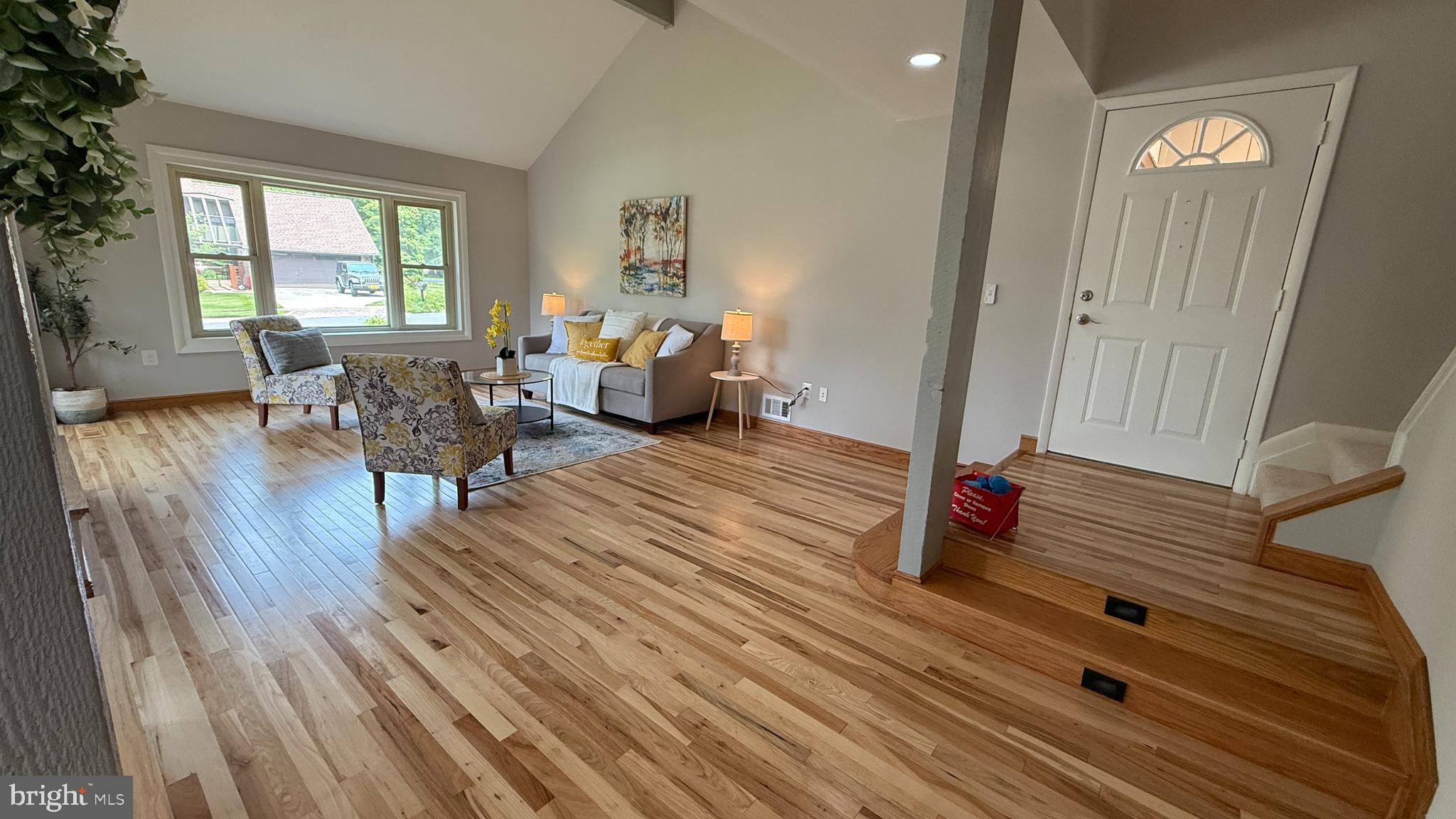 10601 Fiesta Road Fairfax, VA 22032 - Photo 26 of 58 a living room with furniture and a wooden floor