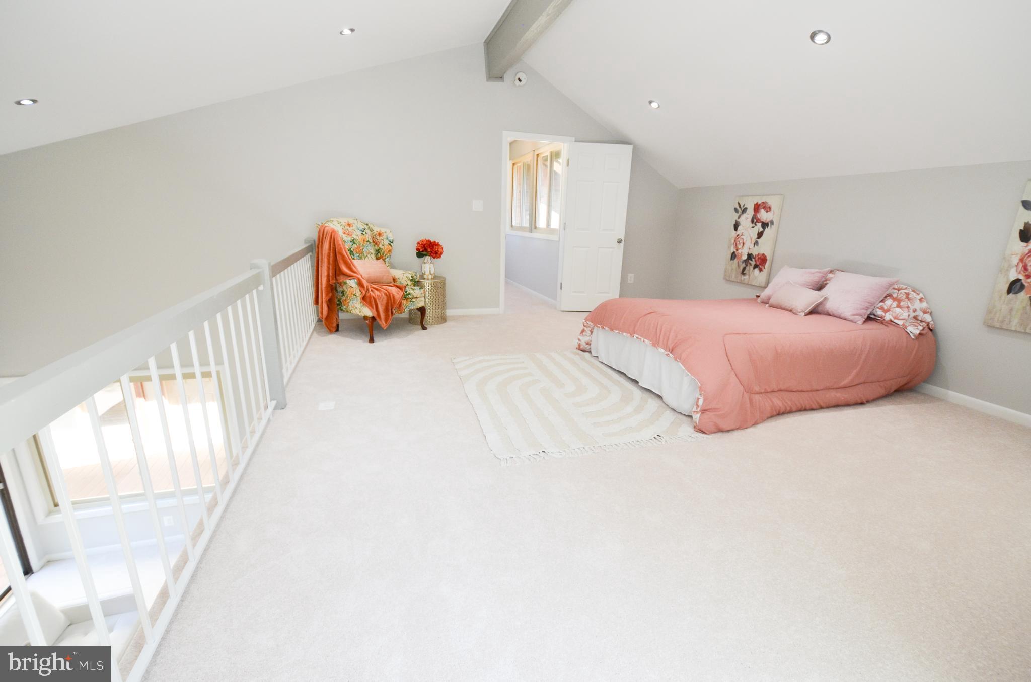 10601 Fiesta Road Fairfax, VA 22032 - Photo 37 of 58 a bedroom with a bed and a large mirror