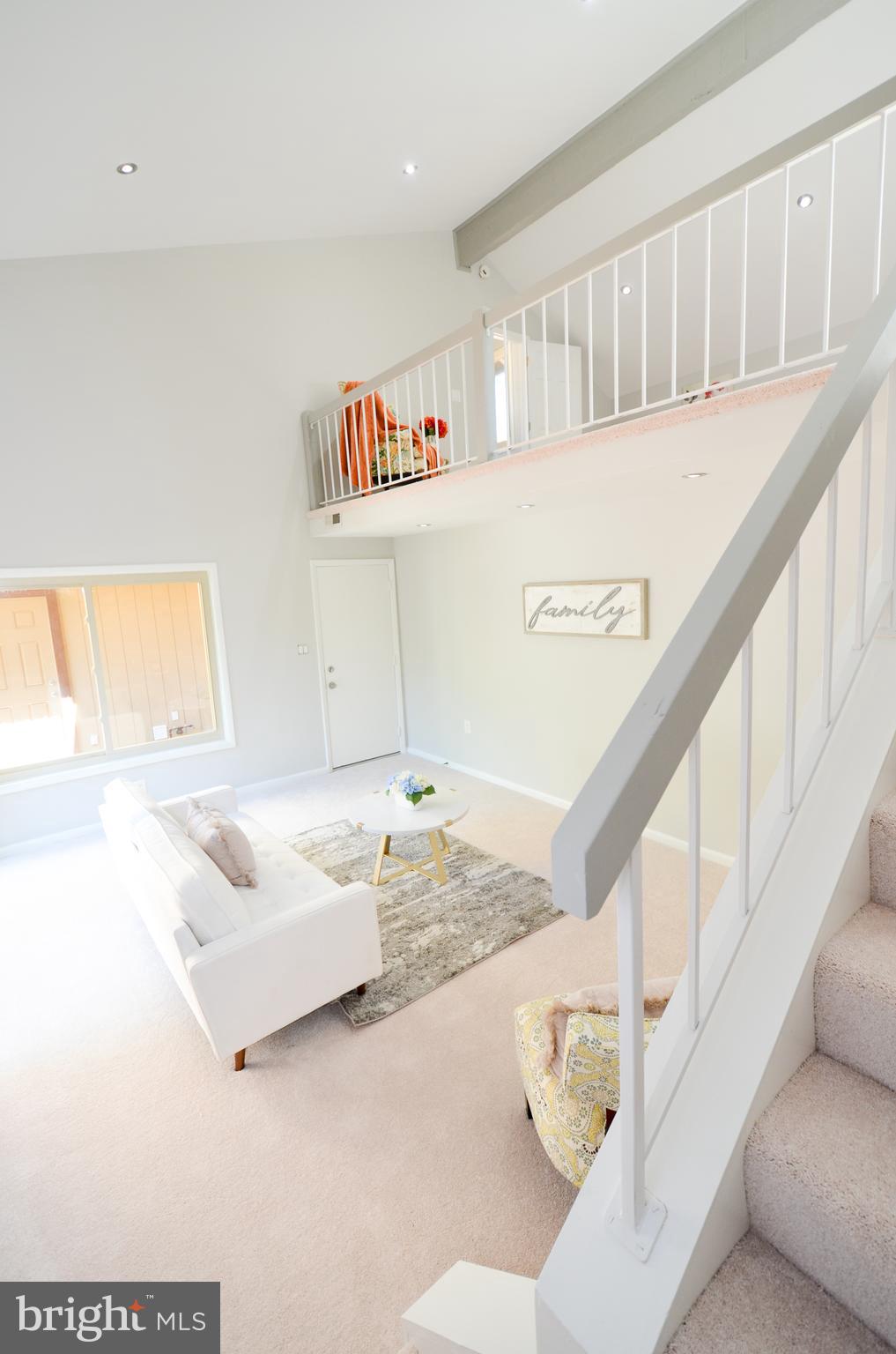 10601 Fiesta Road Fairfax, VA 22032 - Photo 39 of 58 a bathroom with a bathtub and a window