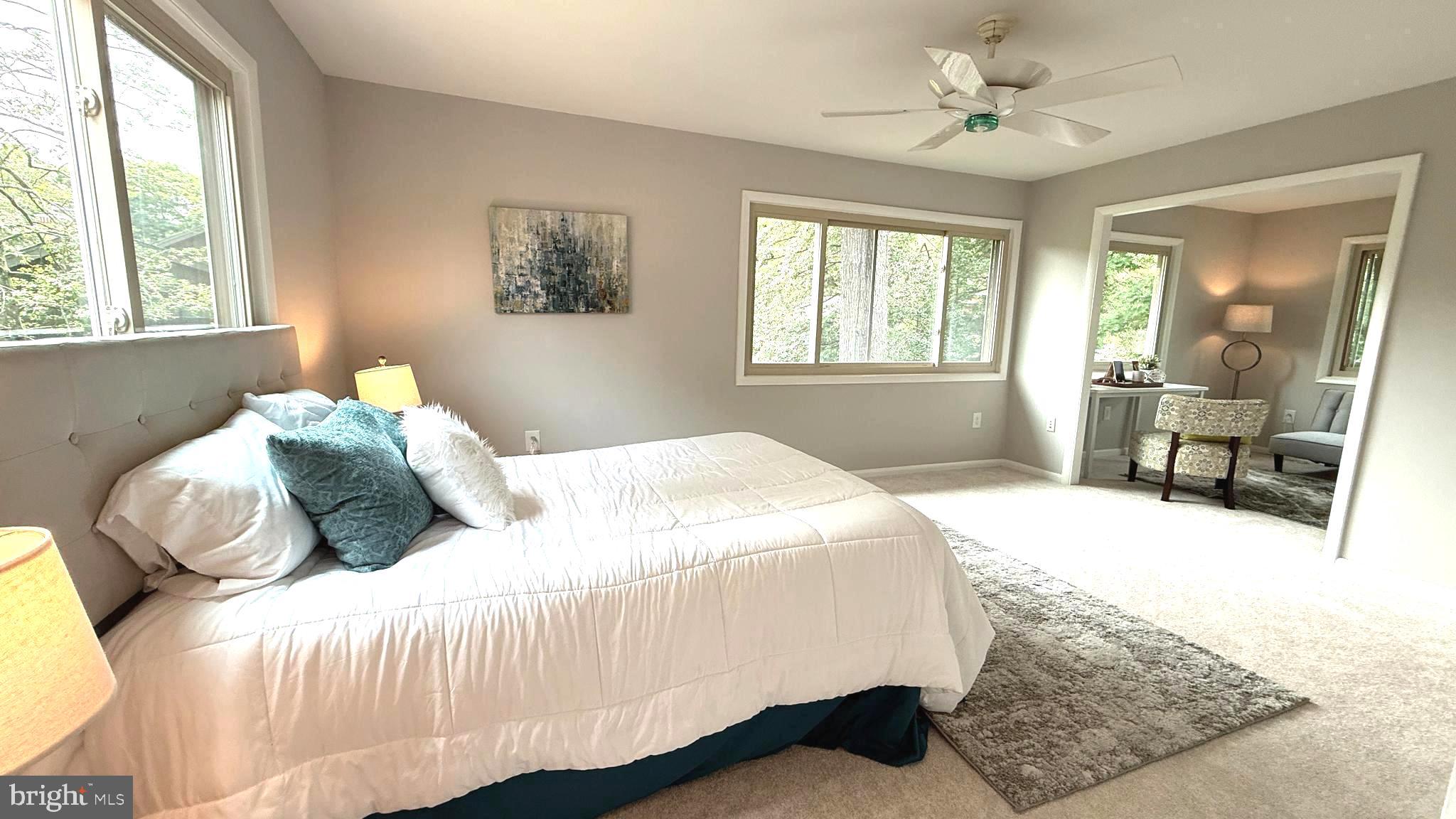 10601 Fiesta Road Fairfax, VA 22032 - Photo 42 of 58 a bedroom with a large bed and a window