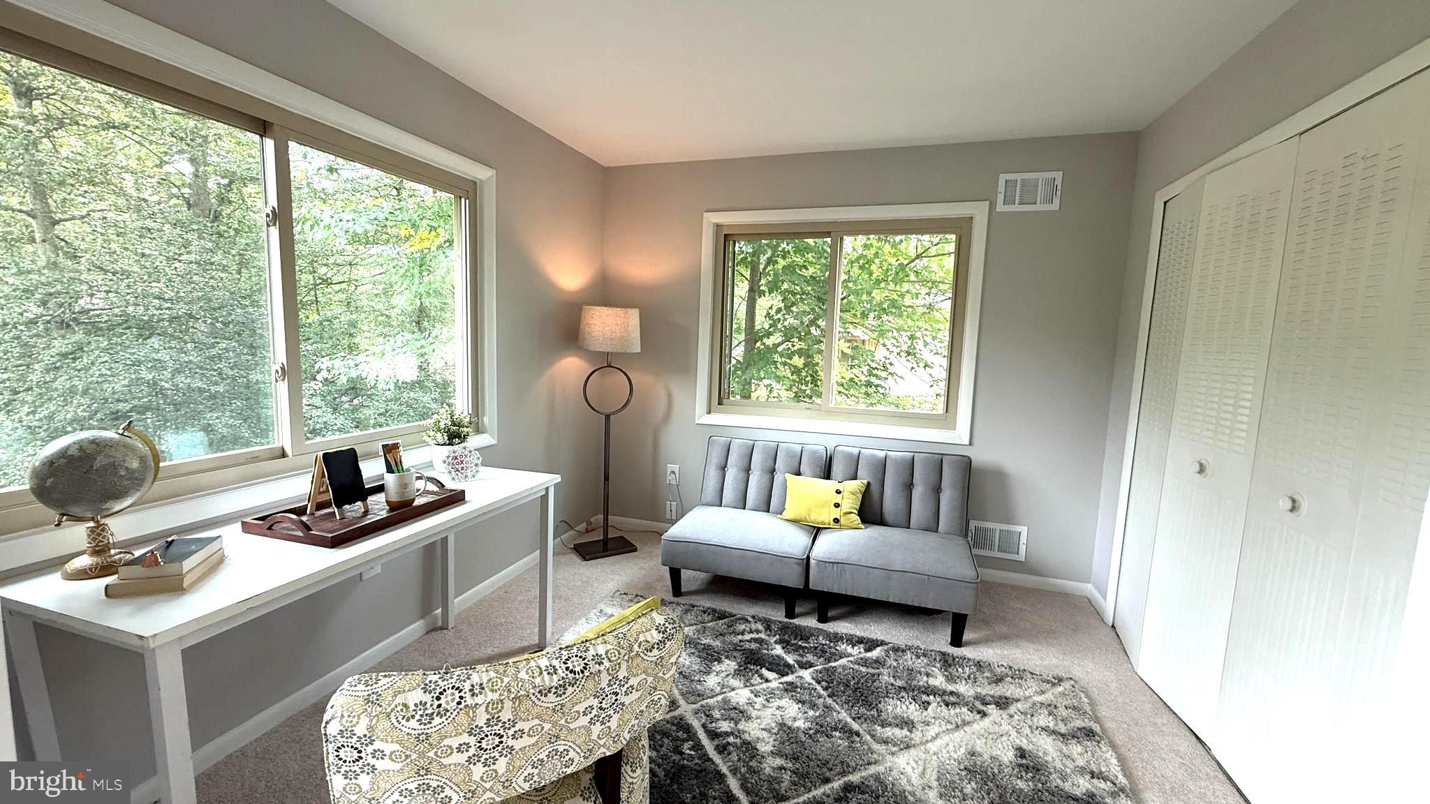 10601 Fiesta Road Fairfax, VA 22032 - Photo 44 of 58 a living room with furniture and a window