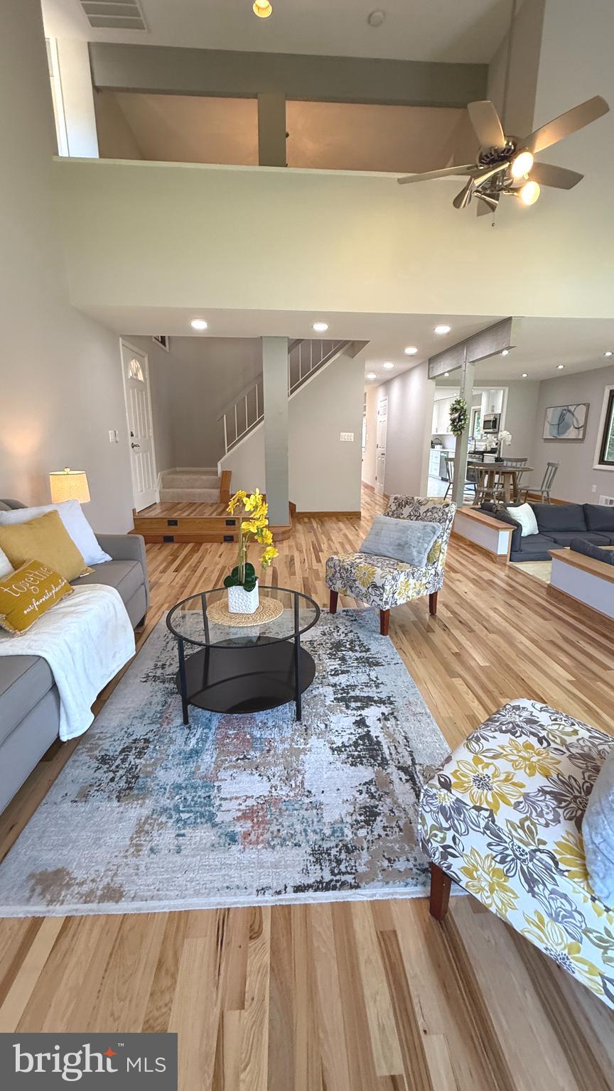 10601 Fiesta Road Fairfax, VA 22032 - Photo 6 of 58 a living room with furniture and a rug