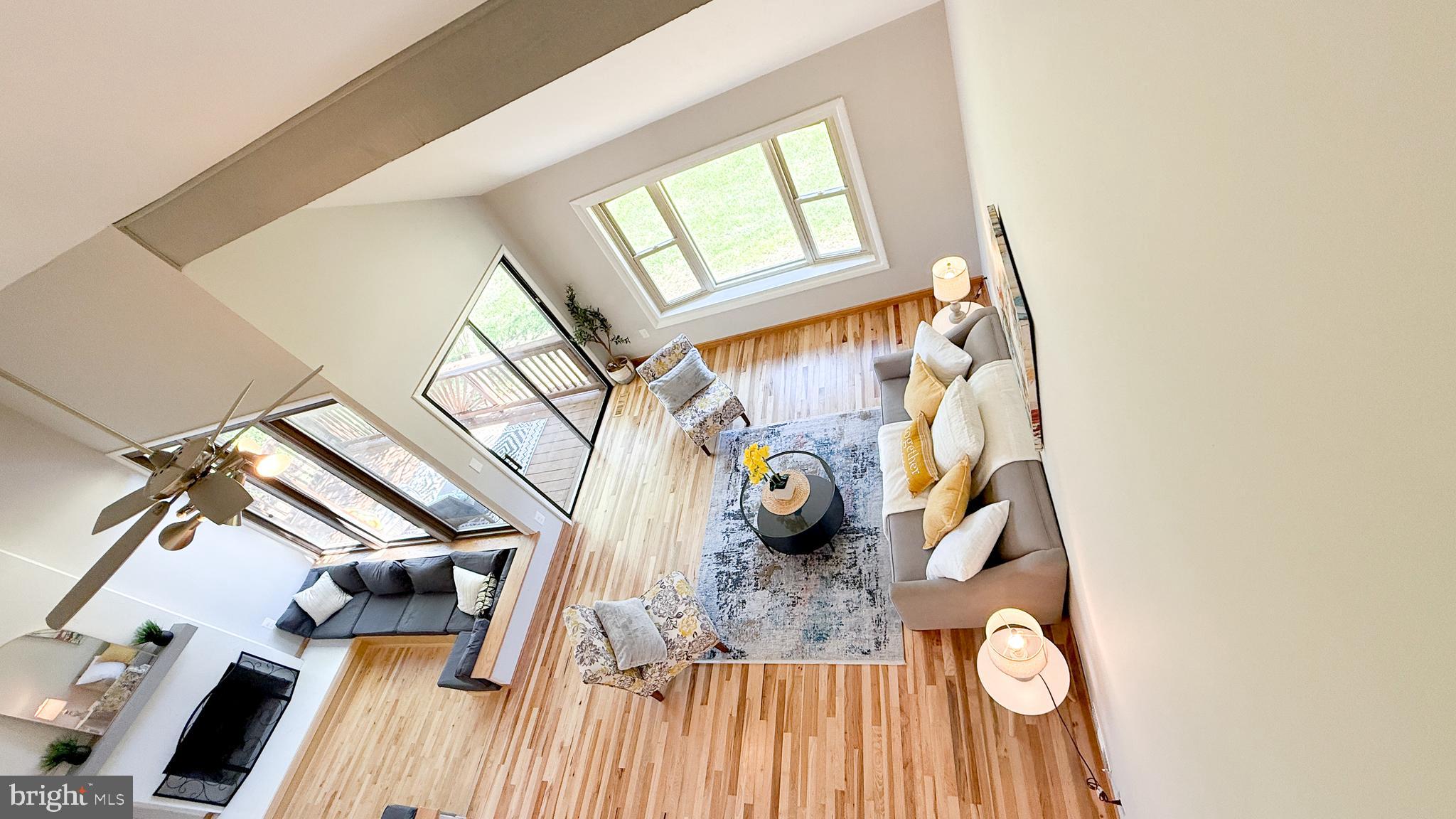 10601 Fiesta Road Fairfax, VA 22032 - Photo 8 of 58 a view of living room with furniture and a window