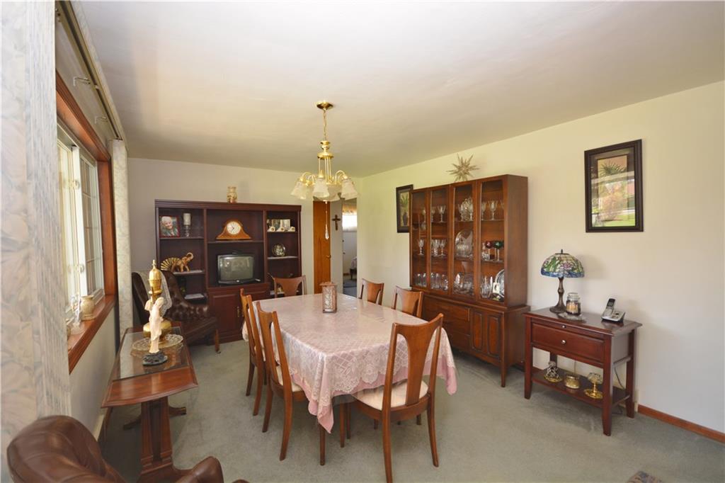 296 Ewings Mill Road Coraopolis, PA 15108 - Photo 3 of 19 Large living room area currently used as a dining room.