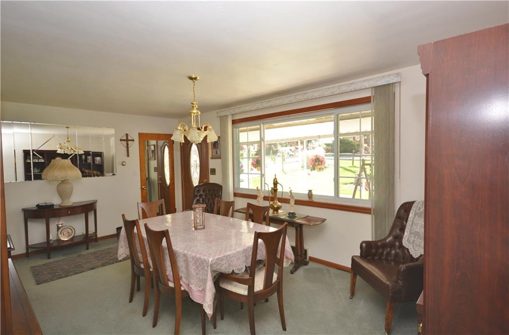 296 Ewings Mill Road Coraopolis, PA 15108 - Photo 4 of 19 Large coat closet in living room, generous window lets in plenty of natural light. New front door and storm door. Plenty of room to use as living/dining room.