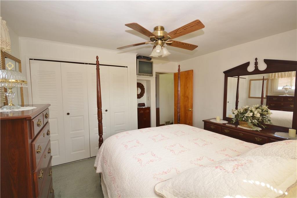 296 Ewings Mill Road Coraopolis, PA 15108 - Photo 8 of 19 Master bedroom features large closet and lovely ceiling fan.