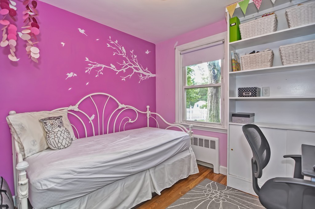 406 Potter Road Framingham, MA 01701 - Photo 14 of 30 a bedroom with a bed dresser and a window