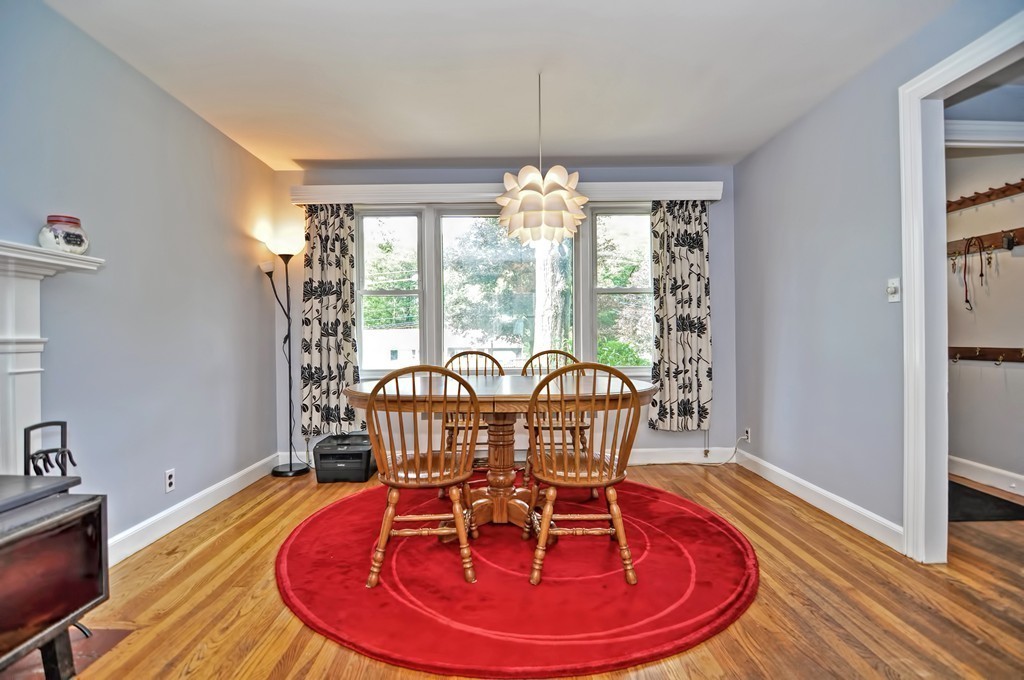 406 Potter Road Framingham, MA 01701 - Photo 8 of 30 a view of a dining room with furniture window and wooden floor