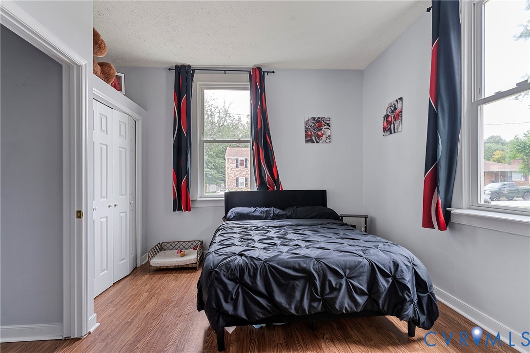 166 Wright Avenue Colonial Heights, VA 23834 - Photo 16 of 36 a bedroom with a bed and a window
