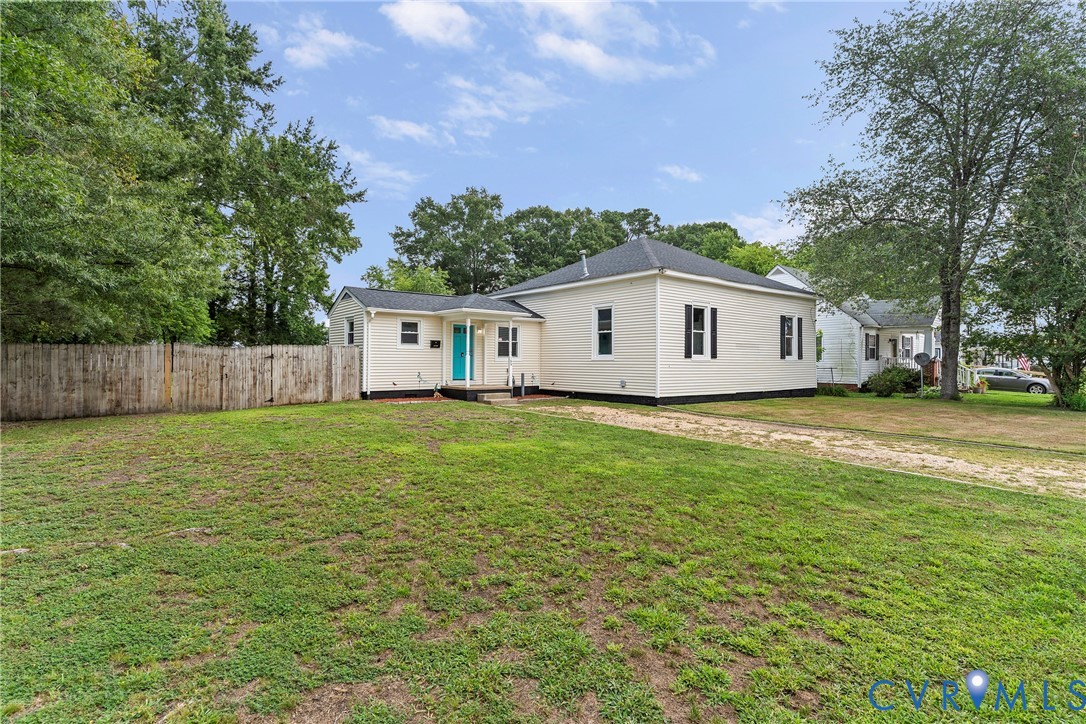166 Wright Avenue Colonial Heights, VA 23834 - Photo 21 of 36 a view of a house with a yard