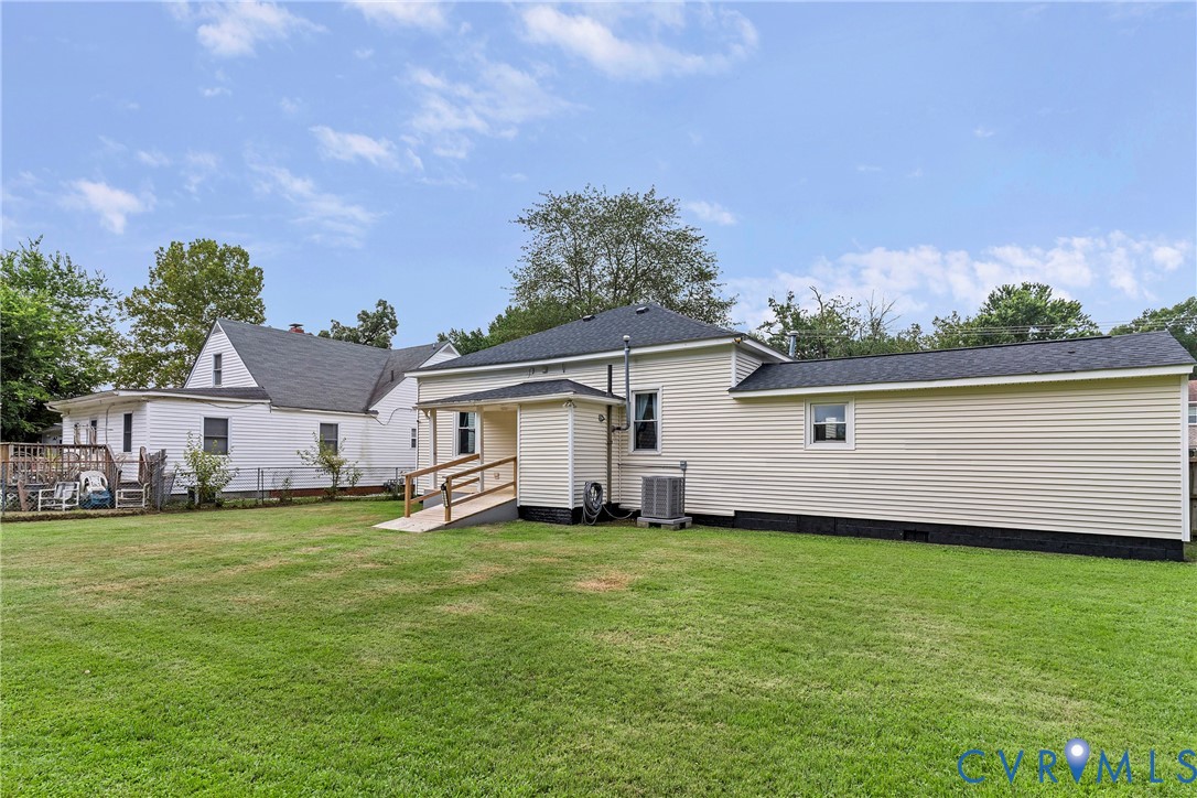 166 Wright Avenue Colonial Heights, VA 23834 - Photo 22 of 36 a view of a house with a yard and sitting area