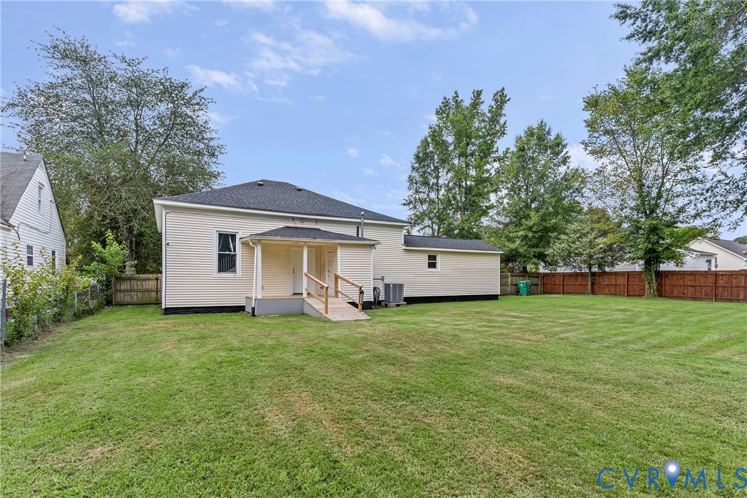 166 Wright Avenue Colonial Heights, VA 23834 - Photo 23 of 36 a view of a house with a yard and trees