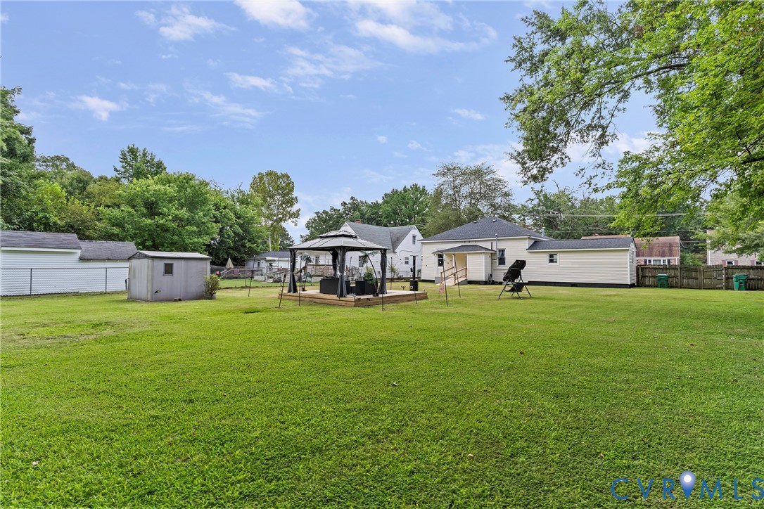 166 Wright Avenue Colonial Heights, VA 23834 - Photo 26 of 36 a front view of a house with a garden