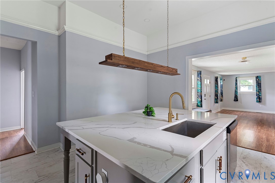 166 Wright Avenue Colonial Heights, VA 23834 - Photo 5 of 36 a kitchen with stainless steel appliances granite countertop a sink a stove and a wooden floors