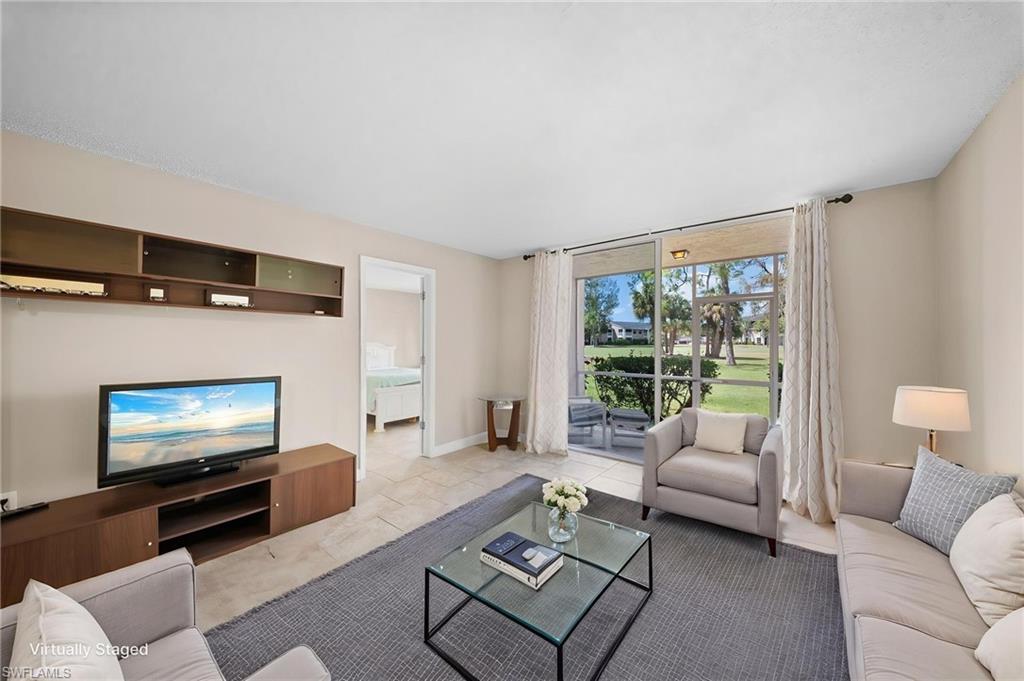 170 Turtle Lake Court, Unit 109 Naples, FL 34105 - Photo 2 of 19 View of living area