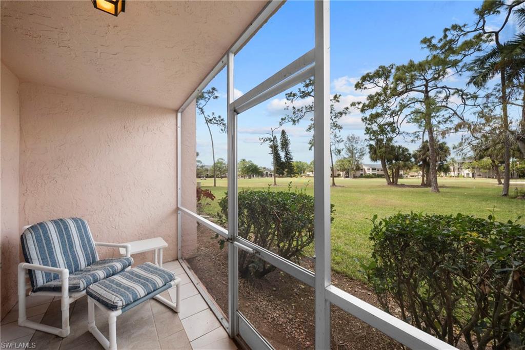 170 Turtle Lake Court, Unit 109 Naples, FL 34105 - Photo 10 of 19 Sunroom featuring vaulted ceiling