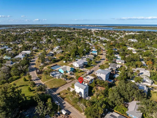 an aerial view of residential building with parking space