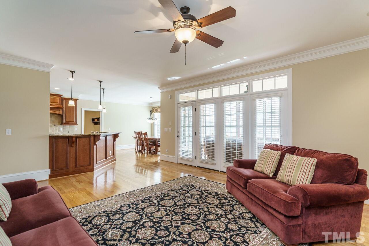 5327 Landguard Drive Raleigh, NC 27613 - Photo 17 of 45 a living room with furniture and a large window