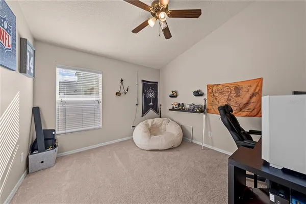 a kitchen with stainless steel appliances granite countertop a stove top oven a sink dishwasher and a refrigerator