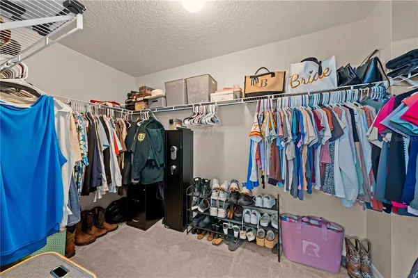 a bedroom with a workspace