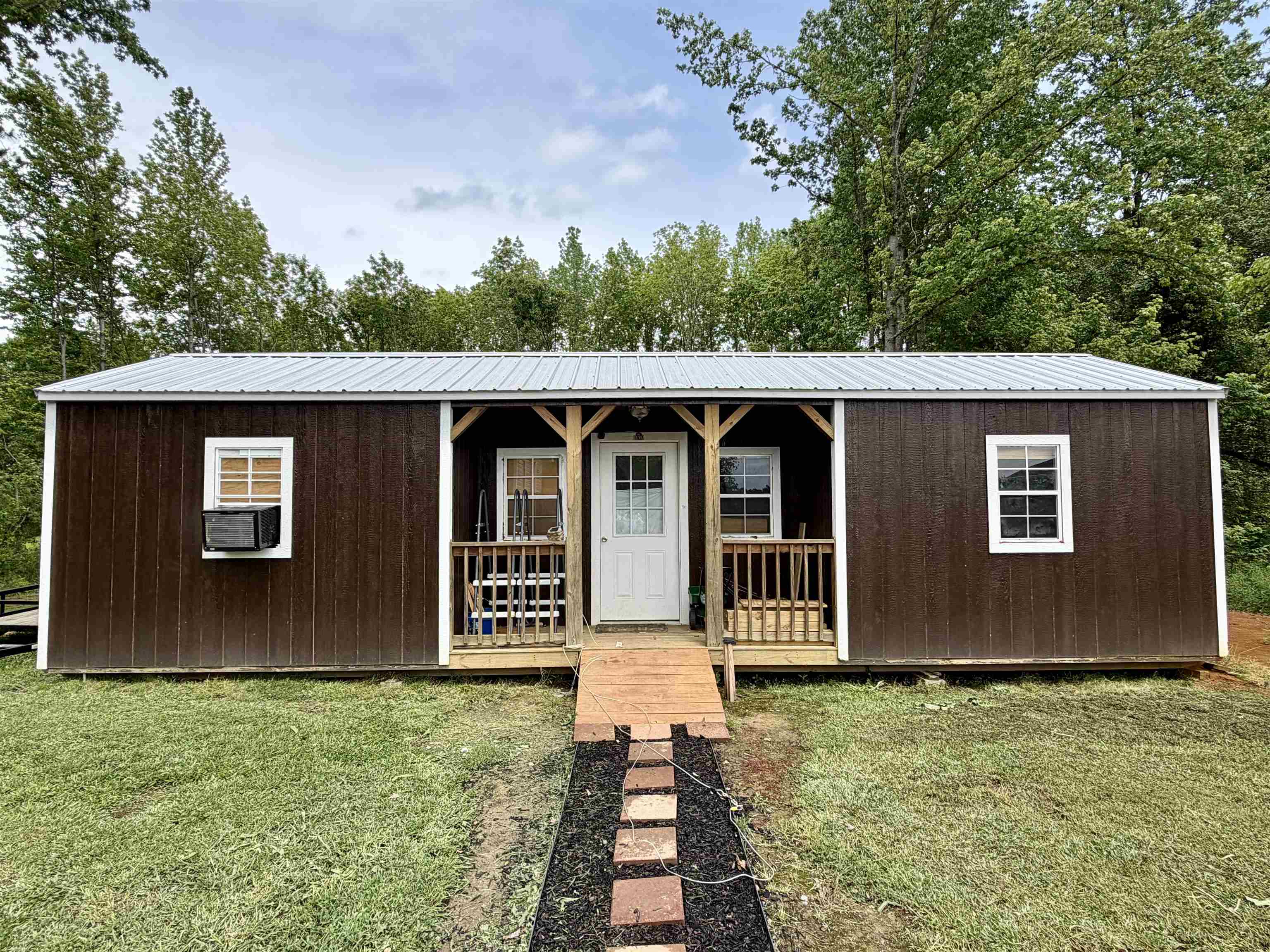 8022 45th Highway Ramer, TN 38367 - Photo 15 of 20 front view of a house with a yard