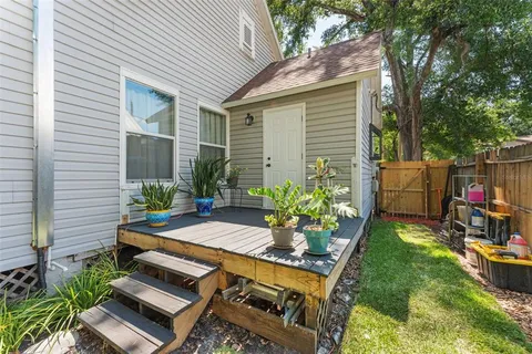 a backyard of a house with seating space