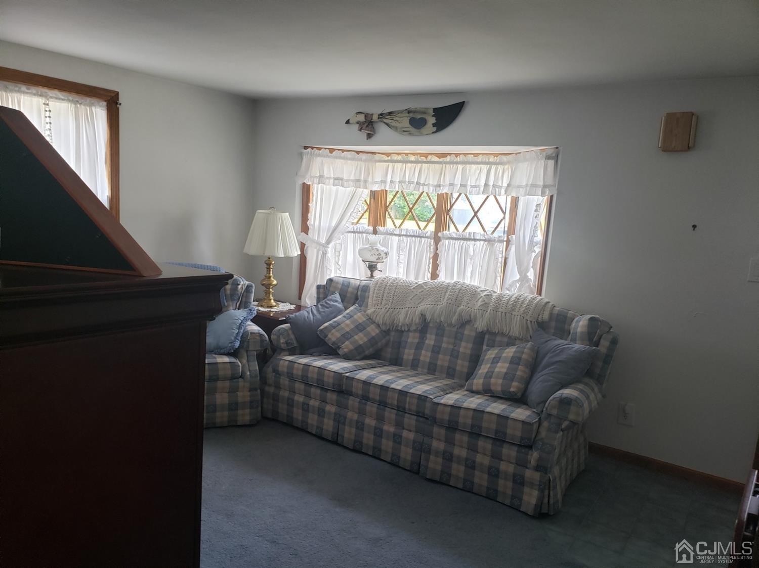 53 West Cliff Road Colonia, NJ 07067 - Photo 6 of 12 View of the living room from the hallway