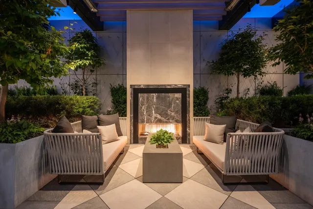 a view of a patio with a bench