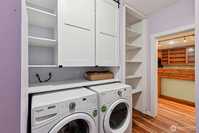 a bathroom with a toilet a sink and a mirror