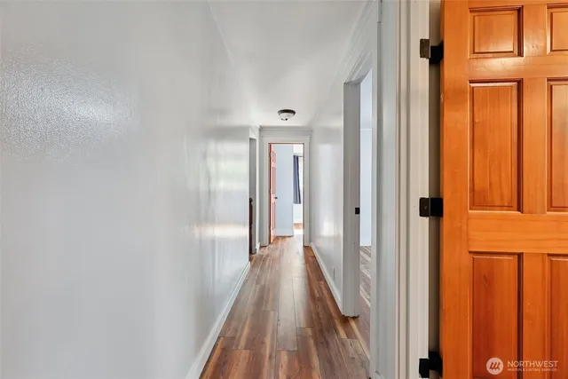 a view of a wooden deck with a bench