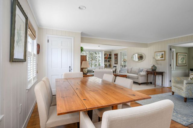 a kitchen with granite countertop a sink and cabinets