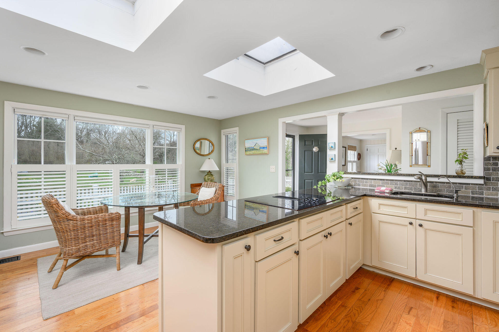 26 Beale Way Barnstable, MA 02630 - Photo 20 of 64 a kitchen with granite countertop lots of counter top space and dining table