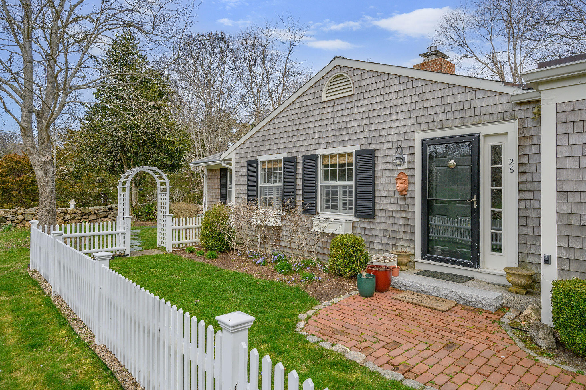 26 Beale Way Barnstable, MA 02630 - Photo 2 of 64 a front view of a house with yard and green space