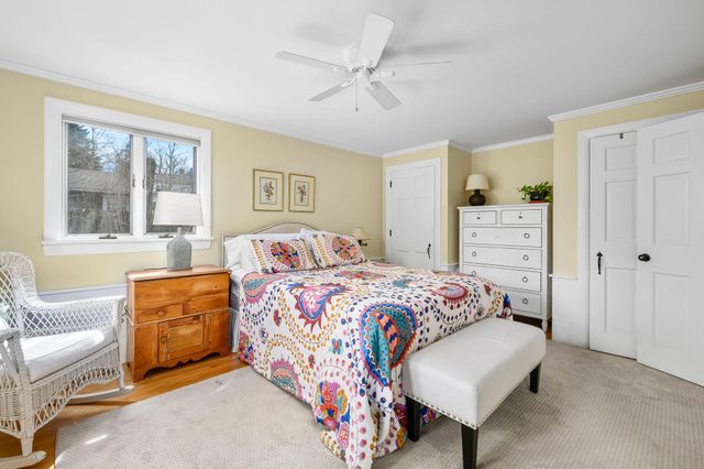 a workspace with furniture and a window