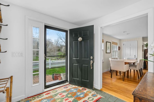 a bed room with a bed and a large mirror