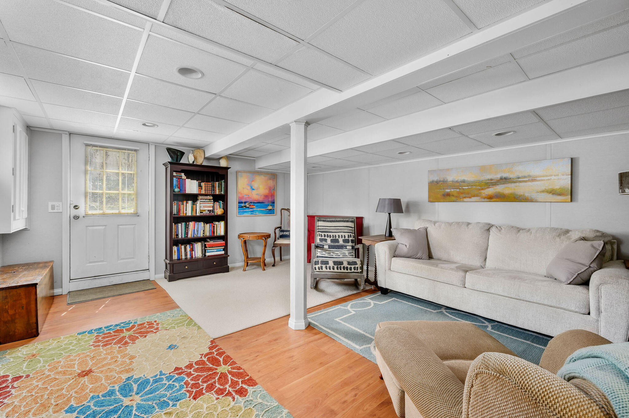 26 Beale Way Barnstable, MA 02630 - Photo 38 of 64 a spacious bedroom with a bed a dresser and a book shelf