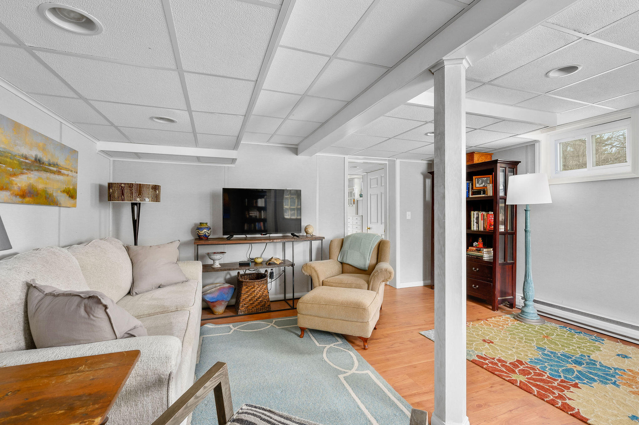 26 Beale Way Barnstable, MA 02630 - Photo 40 of 64 a living room with furniture and a flat screen tv