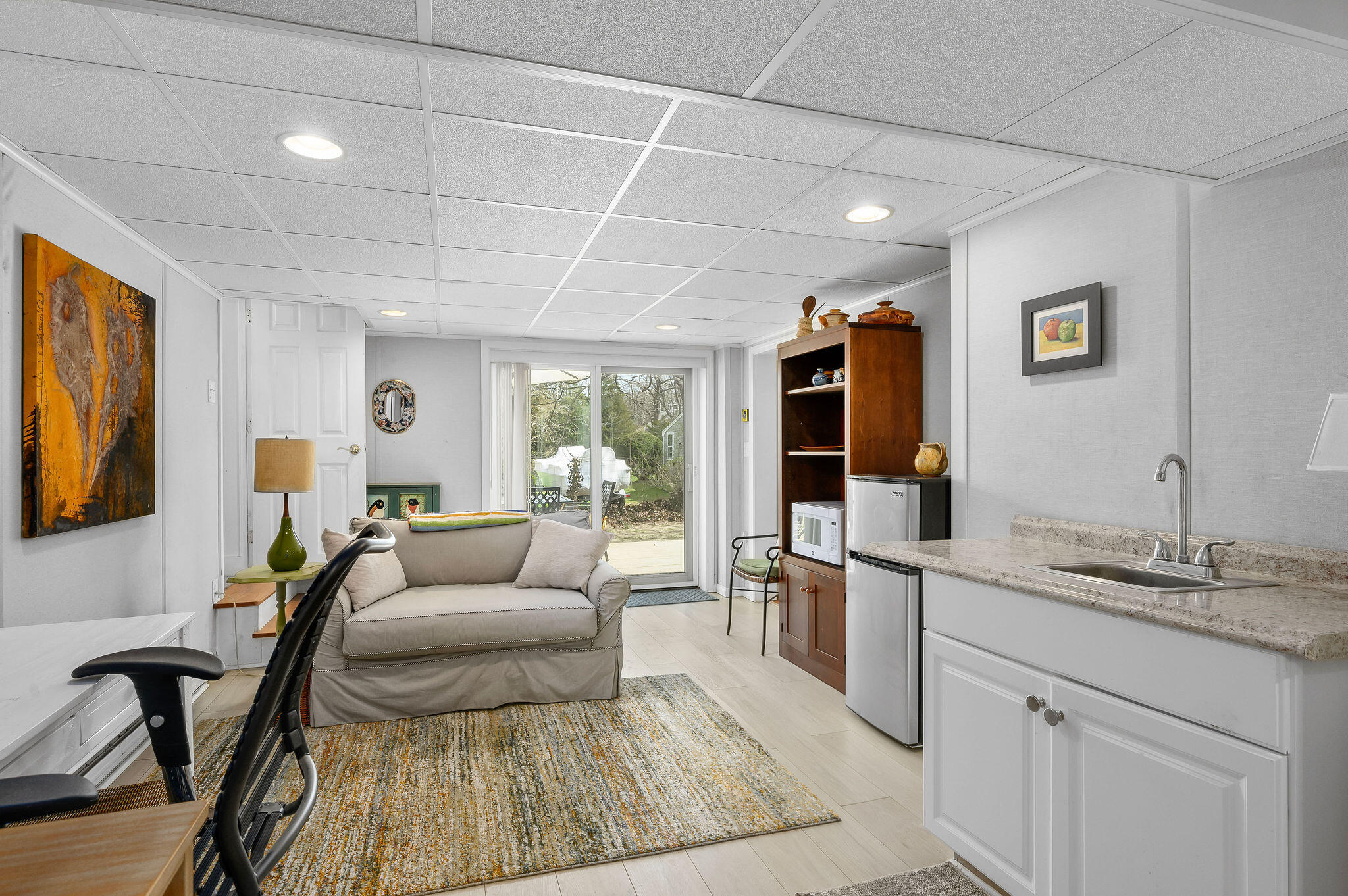 26 Beale Way Barnstable, MA 02630 - Photo 43 of 64 a living room with furniture and a flat screen tv