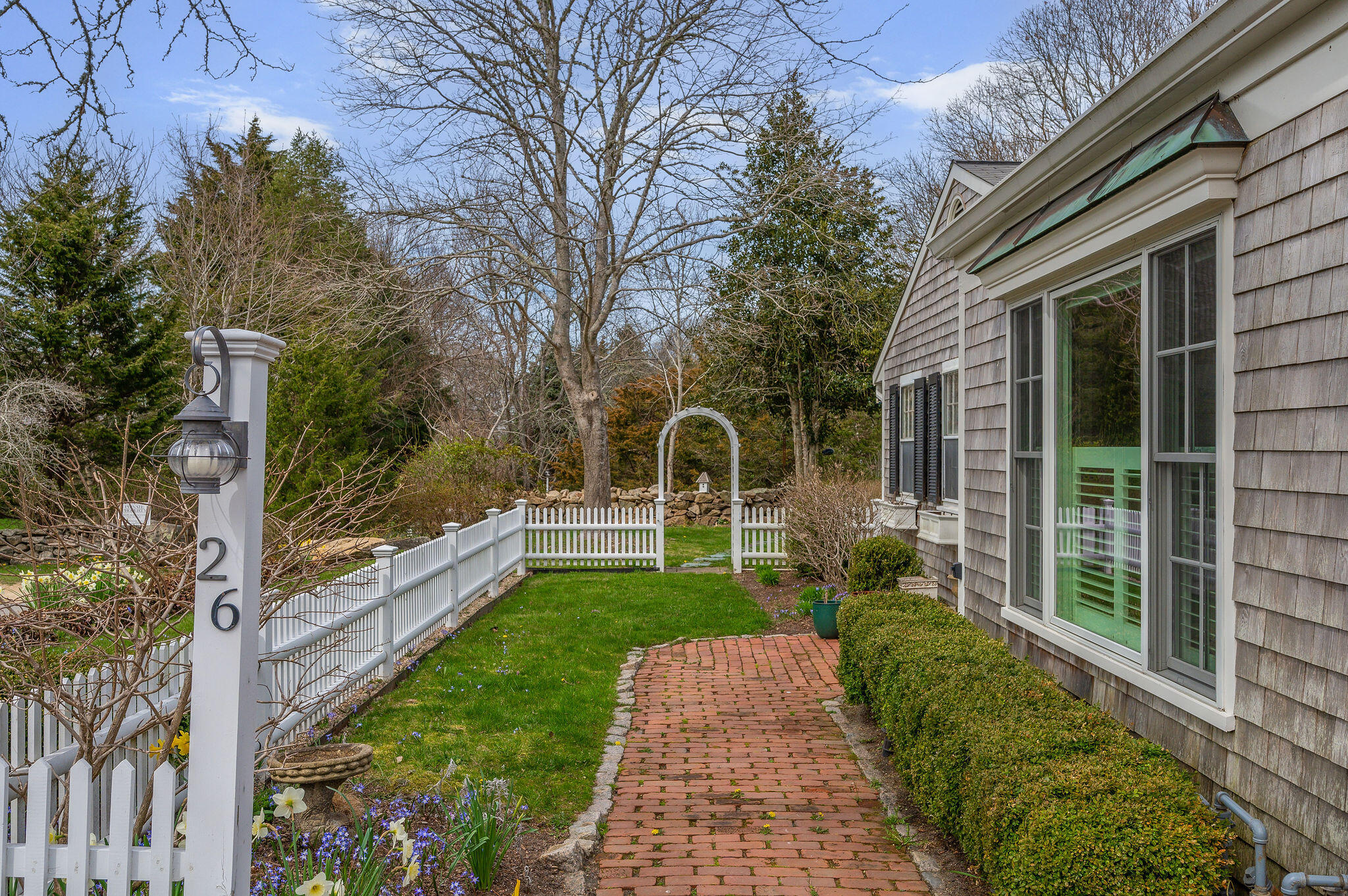 26 Beale Way Barnstable, MA 02630 - Photo 49 of 64 a front view of a house with a yard