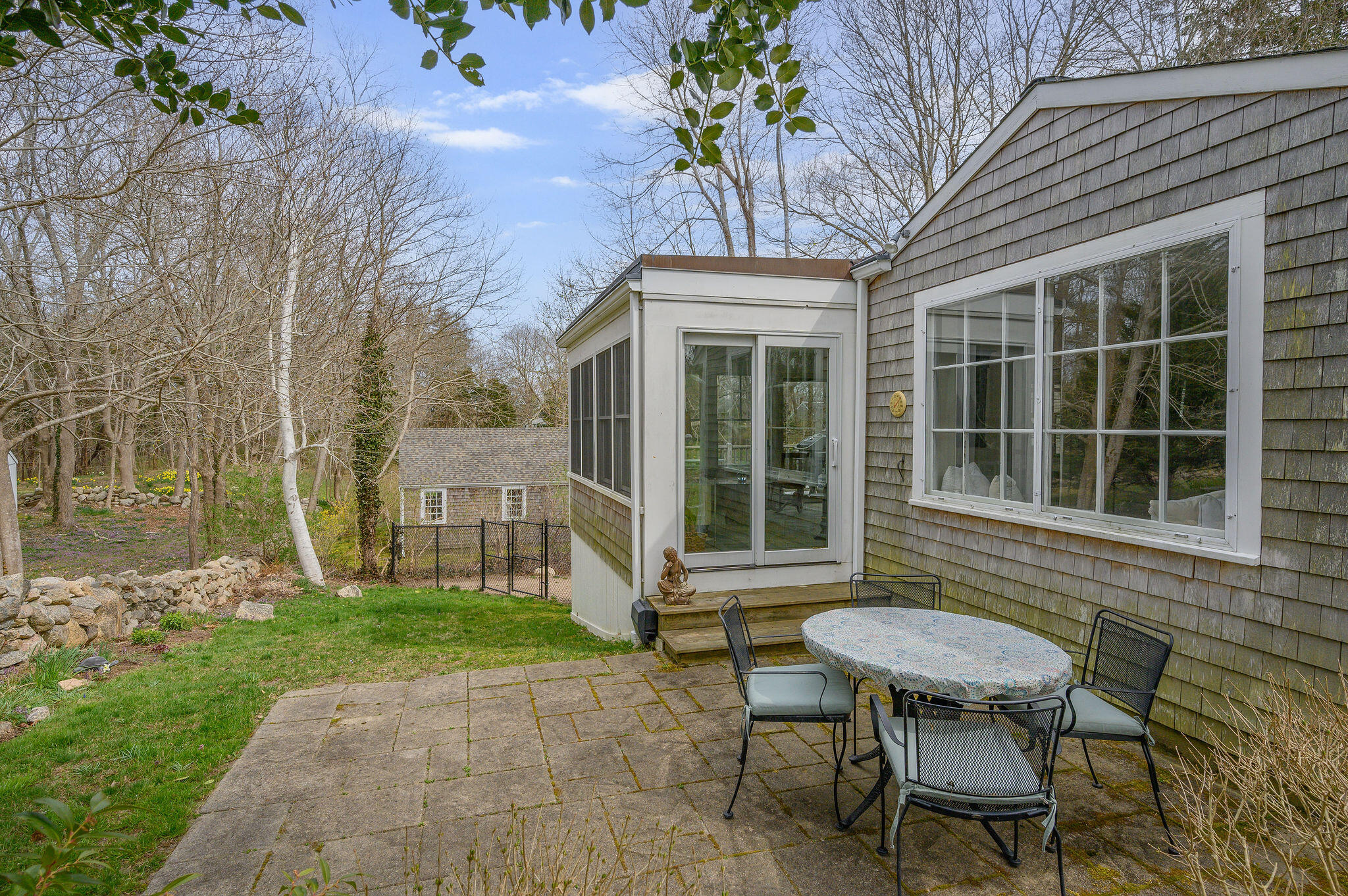 26 Beale Way Barnstable, MA 02630 - Photo 51 of 64 a front view of a house with a yard