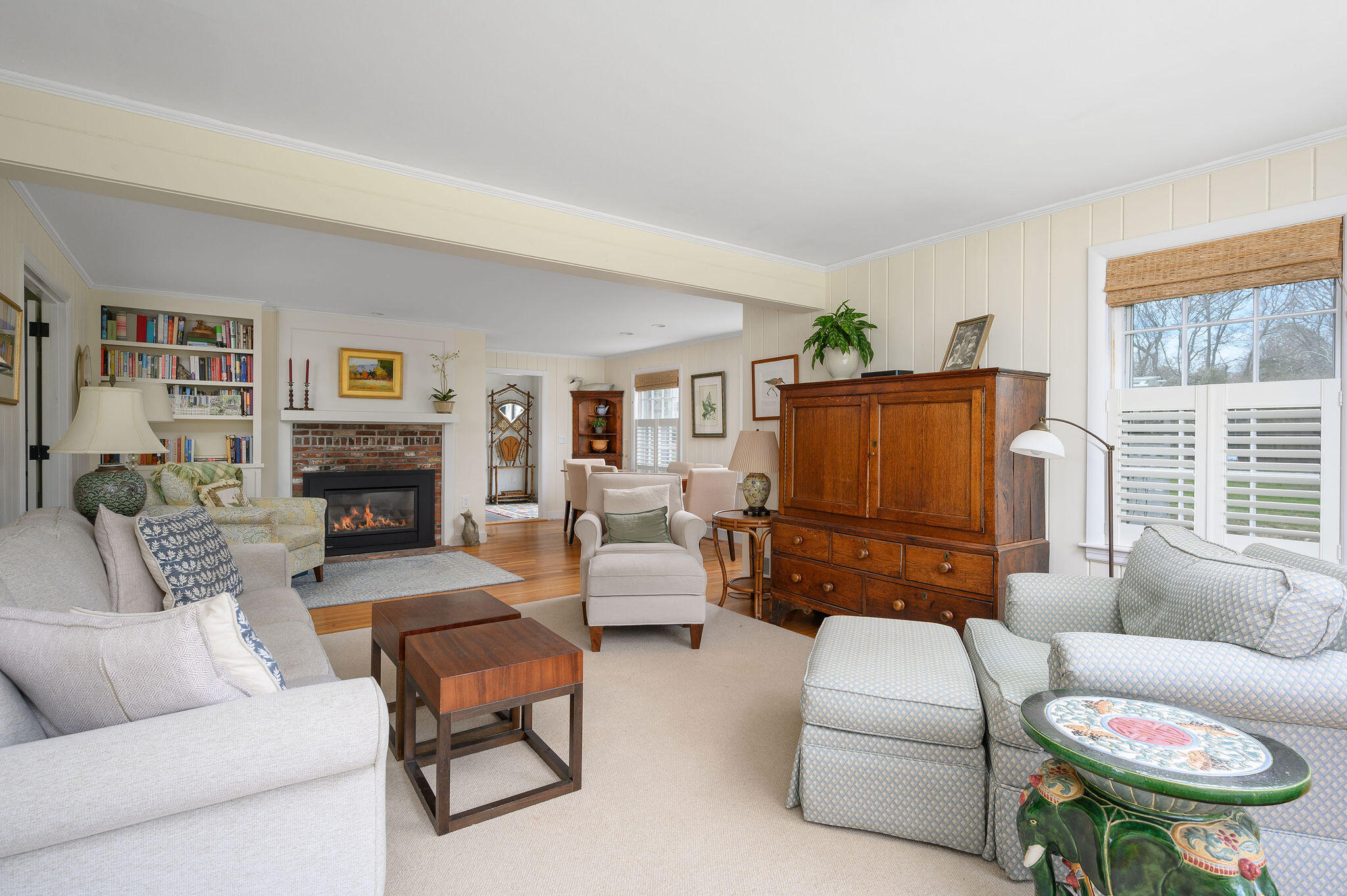 26 Beale Way Barnstable, MA 02630 - Photo 10 of 64 a living room with furniture a fireplace and a window