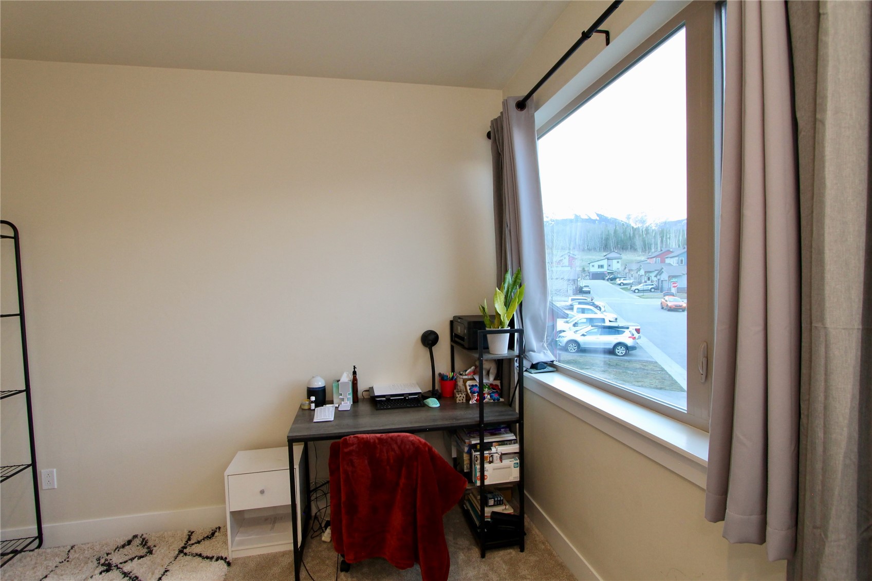 54 Haymaker Street, Unit 54 Silverthorne, CO 80498 - Photo 15 of 21 a view of a workspace with furniture and a window