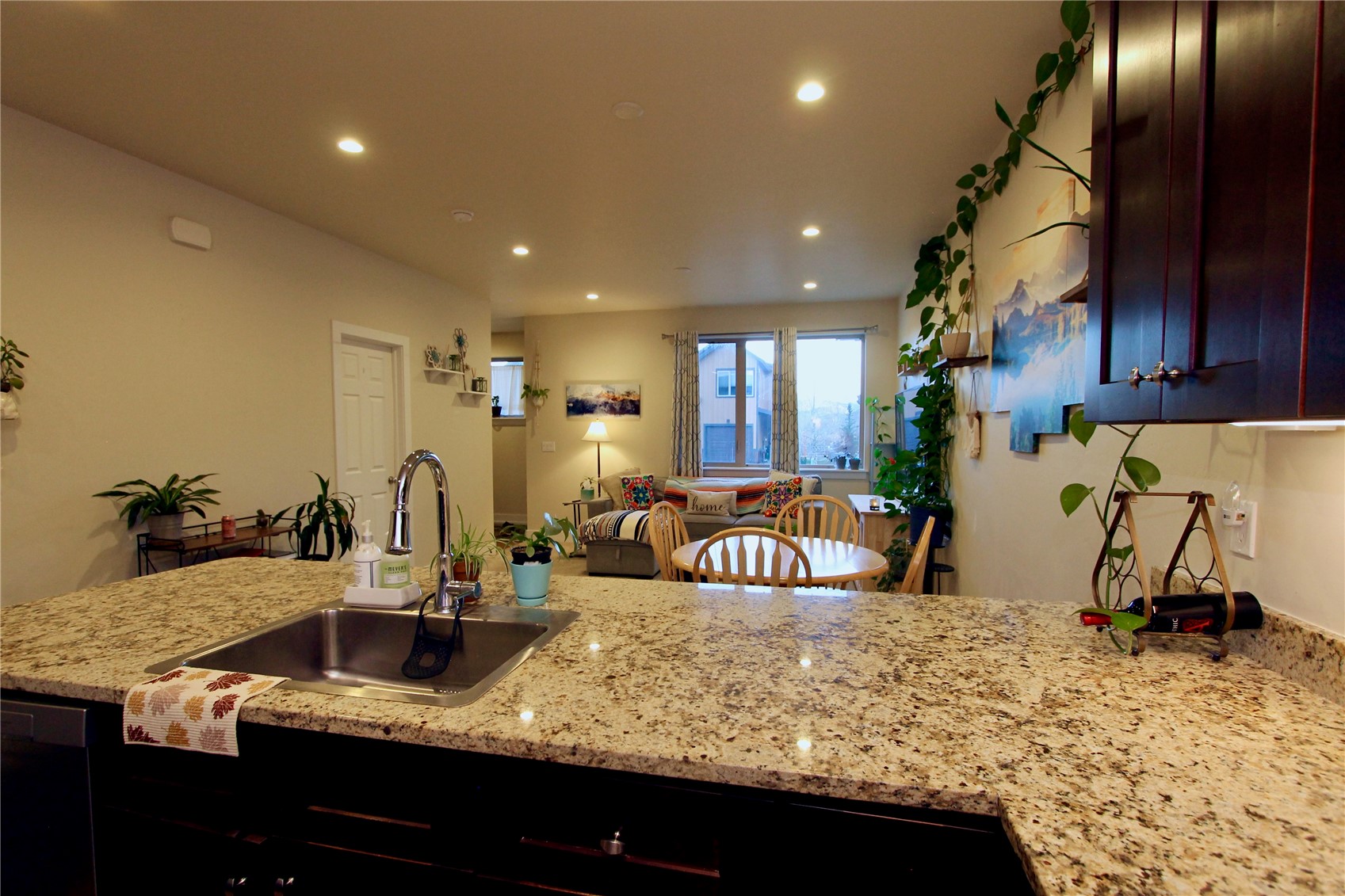 54 Haymaker Street, Unit 54 Silverthorne, CO 80498 - Photo 6 of 21 a kitchen with counter top space cabinets and appliances