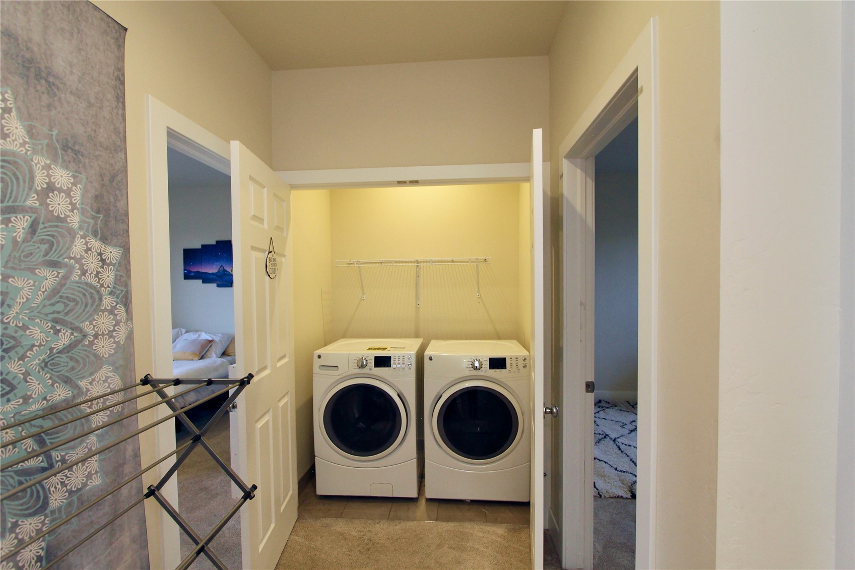 54 Haymaker Street, Unit 54 Silverthorne, CO 80498 - Photo 10 of 21 a utility room with dryer and washer