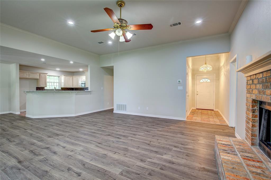 225 Rs County Road 1278 Emory, TX 75440 - Photo 12 of 36 a view of an empty room and a kitchen