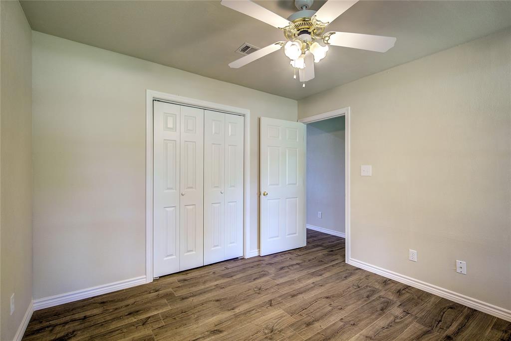 225 Rs County Road 1278 Emory, TX 75440 - Photo 22 of 36 a view of an empty room with a fan