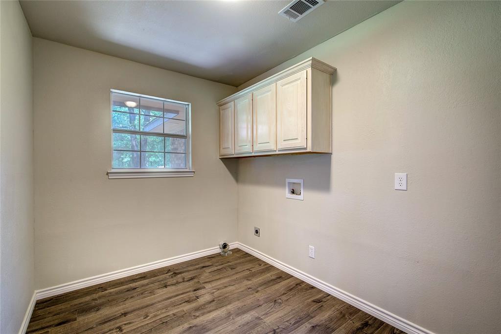 225 Rs County Road 1278 Emory, TX 75440 - Photo 25 of 36 a room with wooden floor and window