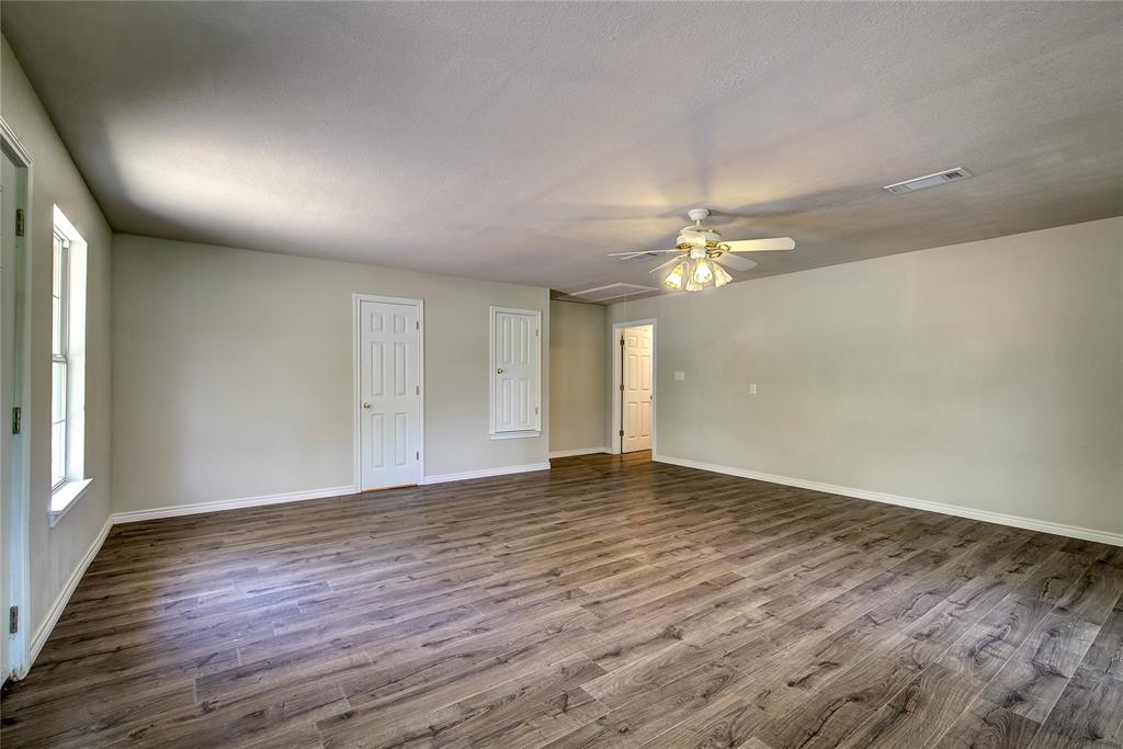 225 Rs County Road 1278 Emory, TX 75440 - Photo 32 of 36 a view of a livingroom with a fan