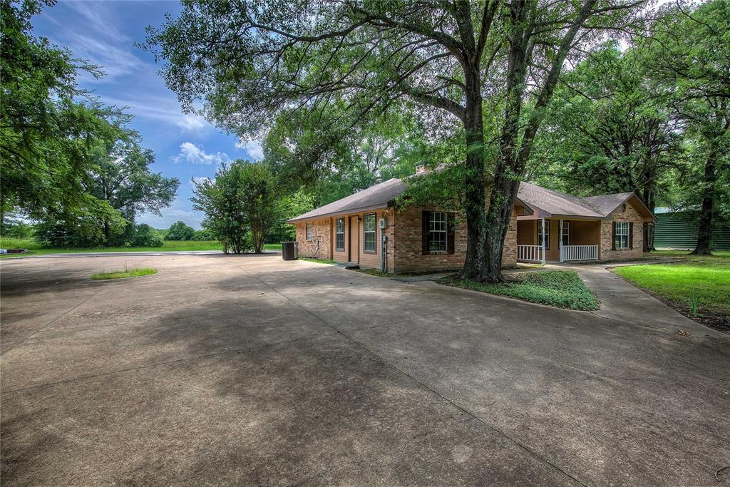 225 Rs County Road 1278 Emory, TX 75440 - Photo 4 of 36 a view of a house with a outdoor space